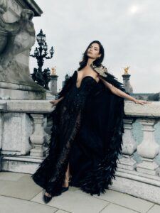 Esha Gupta in a dramatic black feather couture outfit.
